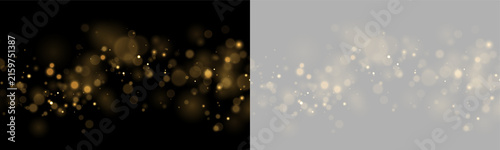 Cuadro en lienzo Scattered golden bokeh lights creating a soft glowing effect on a black backgrou