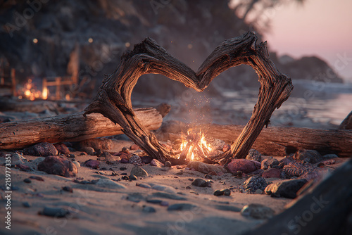 Romantic campfire heart shaped on beach generated.AI