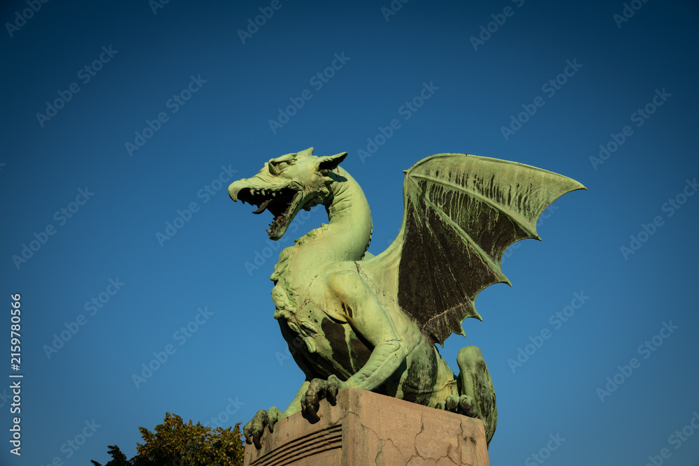 Fototapeta premium Ljubljana Dragon Statue Against Clear Blue Sky in Slovenia
