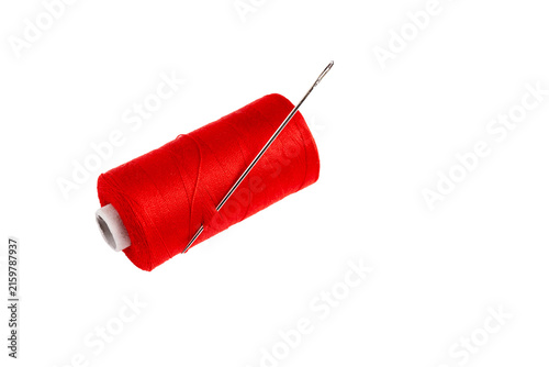 Foto Red thread spool and needle