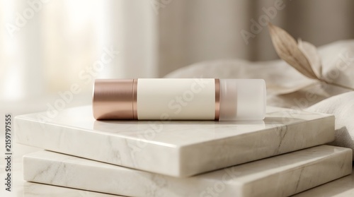 Minimalist beige lip balm tube mockup on white bedding for beauty product branding