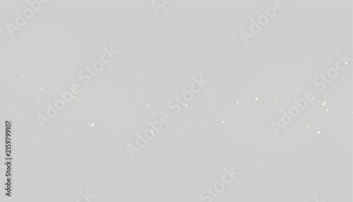 Fotografía Scattered tiny golden light particles with soft glowing halos on black backgroun