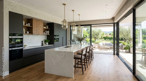Modern Kitchen Island with Contemporary Cabinets and Patio View