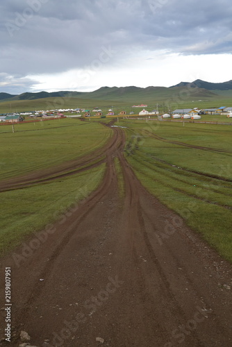 Dirt Road Leading Through the Grasslands to a Mongolian Village in Tsagaan, Arkhangai Province