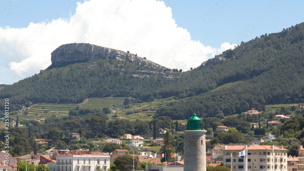 Naklejka premium Scenic View of Cassis Harbor Lighthouse and Cap Canaille Cliffs