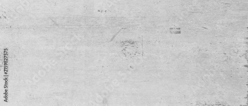 Monochrome distressed texture. black and white scratched and cracked grunge grainy urban background banner panorama long. Dust overlay distress grainy grungy effect..