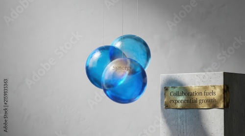 Abstract molecular structure made of three translucent blue glass spheres hanging in modern interior space