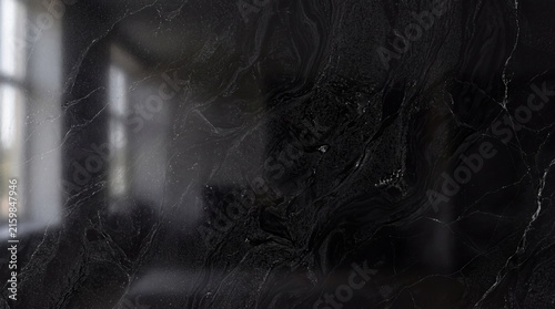 Closeup of black marble texture with white veins and subtle glitter particles, highquality stone surface background