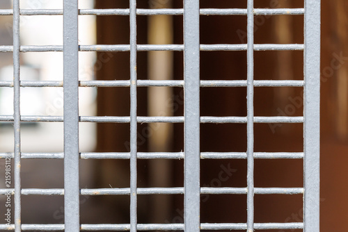 Bild auf Leinwand Rusted metal grid shows weathered texture and grid pattern