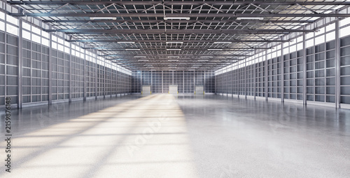 Plakat Empty factory interior filled with natural light