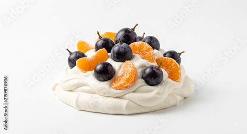 Distant shot of 5 to 10 Kyoho grapes and Redhyang mandarin segments nestled on thick white cheese cream