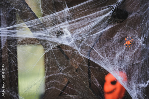 фотографія Spooky Halloween decorations adorn a house porch for festive fun