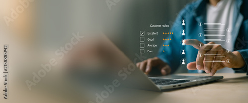 Customer review and employee performance evaluation concept   Professional evaluating user experience and employee service quality on virtual screen.
