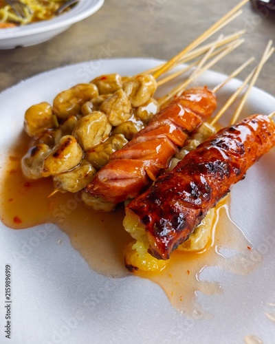 Grilled thai sausages or Lock ching in a marinated sauce, a popular street food.