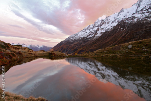 Canvas Print High altitude alpine lake in idyllic land once covered by glaciers