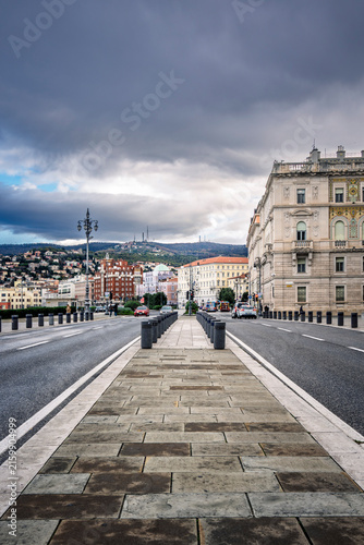 Trieste in winter. Between the sea, snow-capped mountains, and historic monuments.