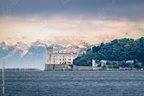 Trieste in winter. Between the sea, snow-capped mountains, and historic monuments.