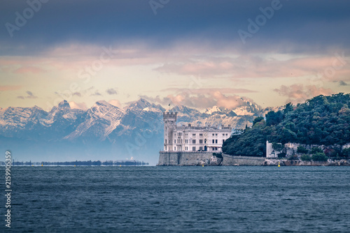 Trieste in winter. Between the sea, snow-capped mountains, and historic monuments.