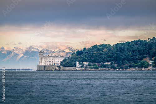 Trieste in winter. Between the sea, snow-capped mountains, and historic monuments.