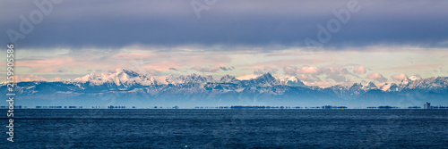 Trieste in winter. Between the sea, snow-capped mountains, and historic monuments.