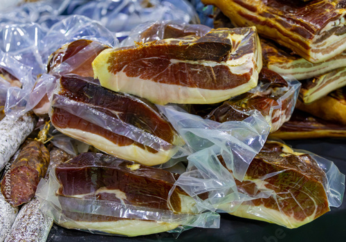 Fresh cured pork and beef meat in packages sold in market stores