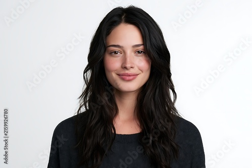 Portrait of a young woman with long dark hair isolated on white background