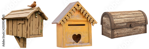 Obraz na płótnie Three wooden containers: a birdhouse, a mailbox with a heart cutout, and a treasure chest, isolated on a white background