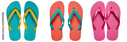 Three pairs of colorful flip-flops isolated on a white background