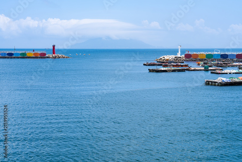Panoramic High Angle View of Coastal Harbor with Red and White Lighthouses