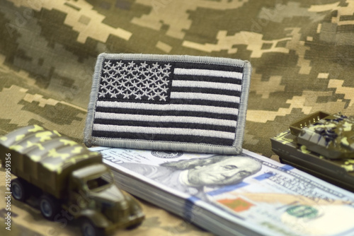 Military equipment on the hundred dollar bill. The history of war financing and military support