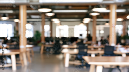 A blurred background of an empty, contemporary office space sets scene for a ...