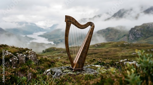 Acoustic Harp Standing on a Mountain Cliff Overlooking a Misty Valley