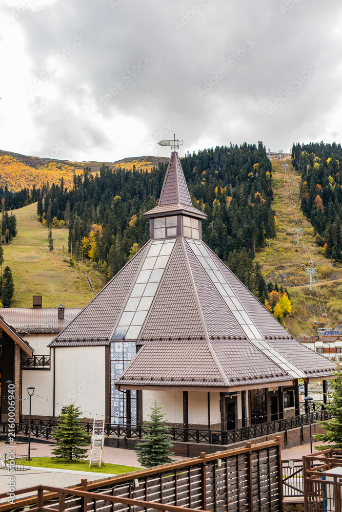 Obraz premium resort square with pavilion and cable car slope in Arkhyz mountains Russia.