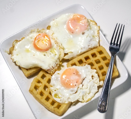 fried eggs with waffles