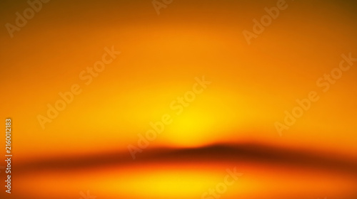 Vibrant orange gradient background with grainy film texture, warm amber light...