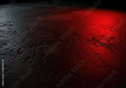 A dark black concrete surface features weathered scuffs and a mysterious red glow emanates from the shadows creating a dramatic atmosphere, moody, grunge, scratch