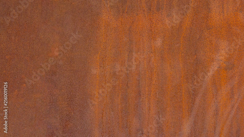 Grunge rusty orange brown metal corten steel stone background texture banner panorama..