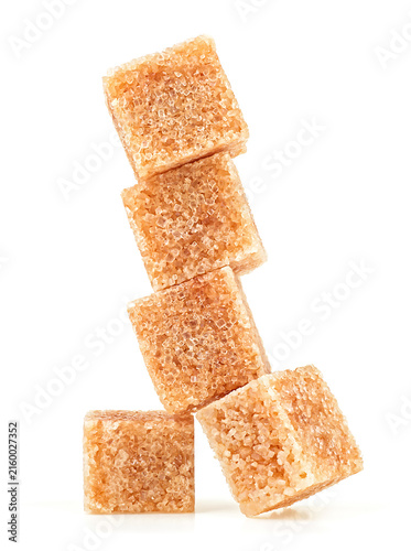 Canvastavla Brown cane sugar cubes isolated on a white background