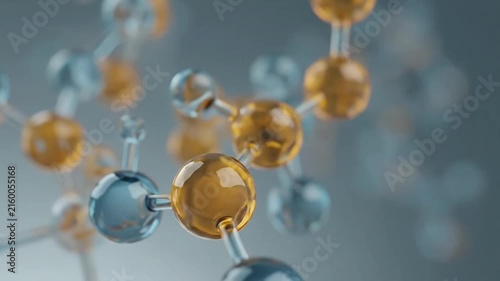 Macro view of amber and gold molecular structures.