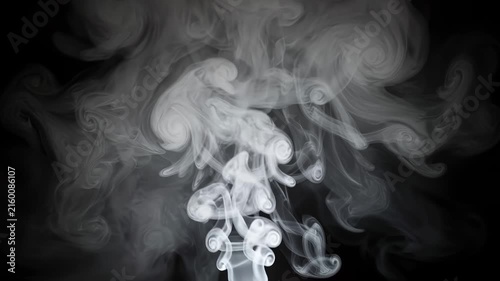 Abstract white smoke swirling against a black background