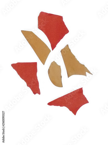 Abstract red and gold paper pieces isolated on white