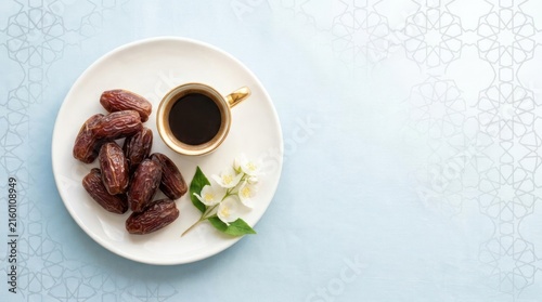 Plate of dates and coffee cup on patterned surface.
