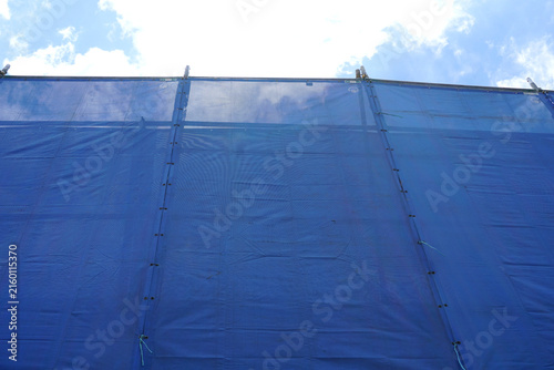 Light blue slanding net is used to cBule slanding net is used to cover the electric train base structure, used for temporary wall around construction site, fence prevents dust from construction site.	