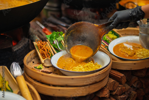 Canvas Print The famous Khao Soi Yukkamai restaurant at Baan Kang Wat, Chiang Mai, Thailand  An open-air Northern Thai restaurant at Baan Kang Wat, featuring bamboo décor, perfect for lunch in Chiang Mai Thailand