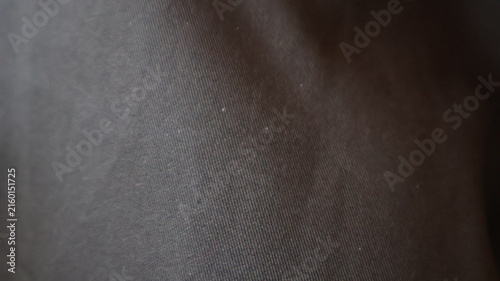 Close up texture of dark brown fabric