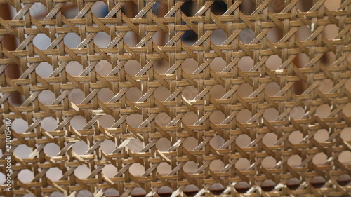 Close up of woven rattan cane webbing texture