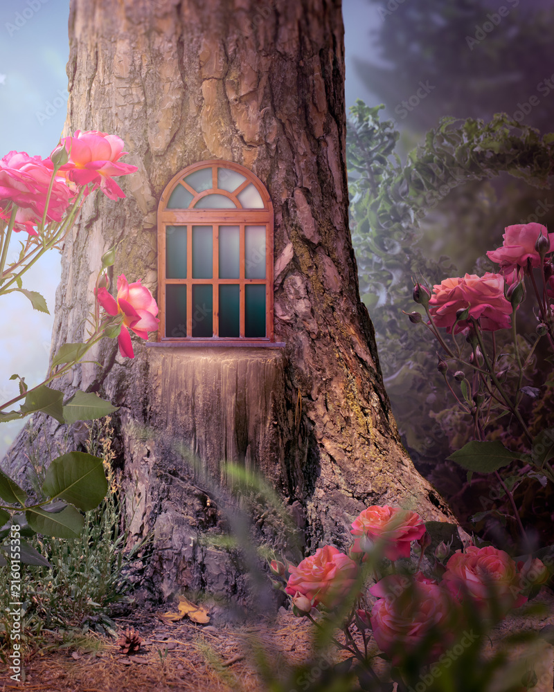 Fototapeta premium Whimsical fantasy elf or gnome house in pine tree with window frame, whimsy enchanted fairy tale forest with fabulous fairytale blooming roses flower garden in misty night, mystical nature landscape.