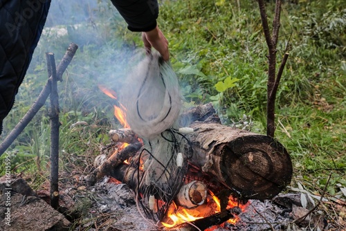 Disposal by burning illegal fishing nets.