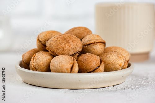 Homemade vegan cookies with coconut condensed milk filling, sugar, gluten and lactose free dessert.