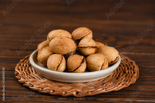 Homemade vegan cookies with coconut condensed milk filling, sugar, gluten and lactose free, autumn dessert.
